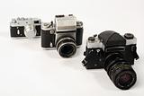 Three photo cameras