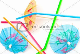 Colored straws and umbrellas