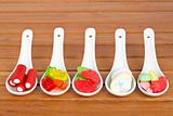 Candies in the spoons