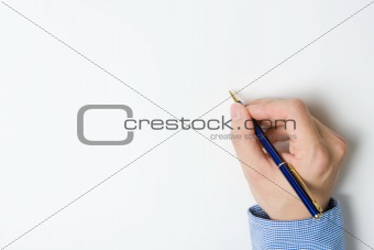Person writing on paper