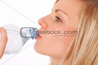 blonde female drinking water