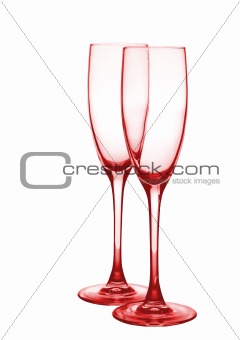 Two red glasses for champagne. On a white background.