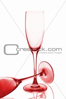 Two dark red glasses for champagne. On a white background.
