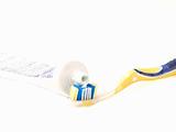 Modern tooth brush and toothpaste isolated on white