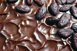 Chocolate icing and cocoa beans
