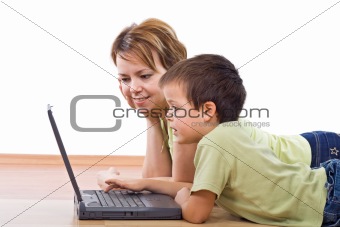 Mother and child surfing the net together
