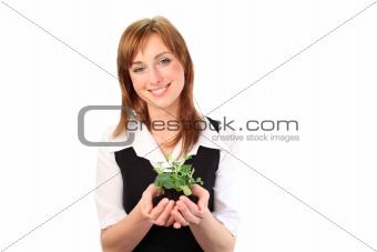 Woman holding a plant