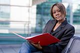 African american business woman with folder