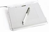 Graphic tablet with pen on white background