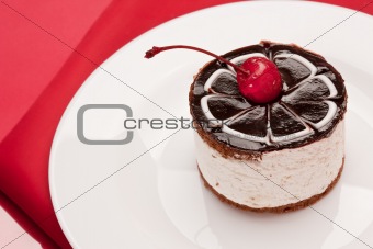 fancy cake with cherry