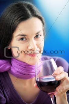 Woman drinks wine