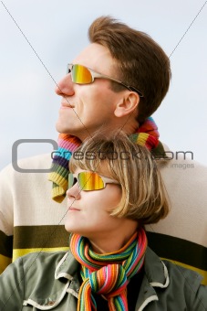 young couple in sunglasses