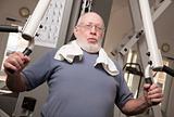 Senior Adult Man Working Out in the Gym.