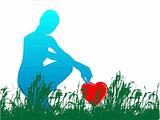 silhouette of a young woman picking love heart from grass