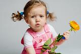 Toddler with rose