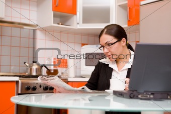 businesswoman in kitchen