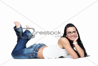 Young cheerful girl in blue jeans on white