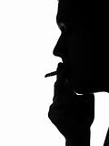 Silhouette of a man smoking