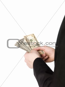 Holding a buntle of dollar-bills