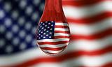 American flag seen trough water droplet