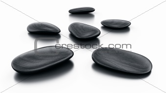 Black stones on reflective floor