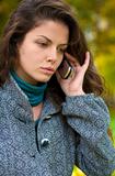 Beautiful young woman talking on cell phone