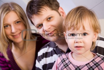 Little girl with parents