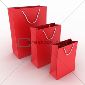 Three red shopping bags on white background