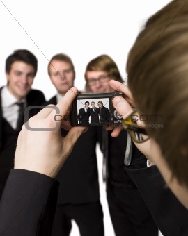 Man taking photo of his friends