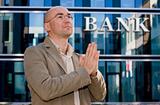 investment banker praying