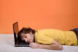 A man sleeping on the laptop