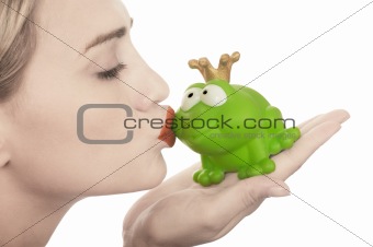 Frog price being kissed by a beautiful glamour model