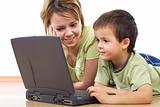Woman and little boy with a laptop