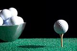 Bowl of Golfballs and Tee