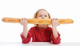 Girl biting a French bread