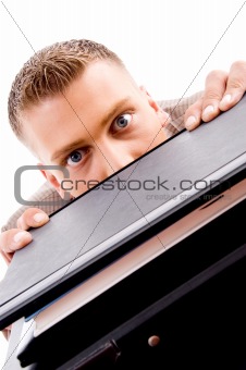 man peeping from files