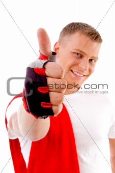 workout - man with thumbs up at gym