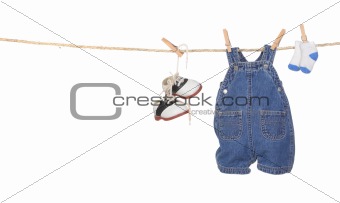 Cute Baby Boy Clothes Hanging on a Rope