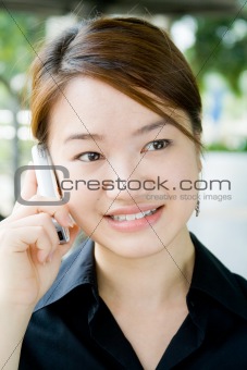 Asian business woman with phone