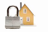 Lock and House Isolated on a White Background.