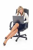Pretty girl on office chair holding notebook