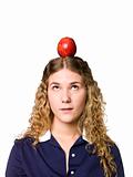 Girl with an apple on her head
