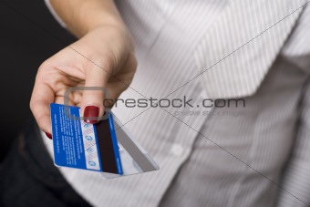 Female hand holding credit cards