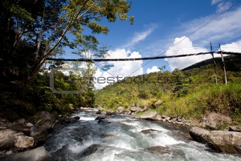 Mountain River with Hanging Bridge
