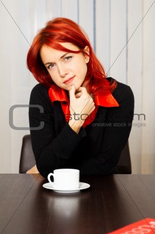 pensive caucasian businesswoman in the office