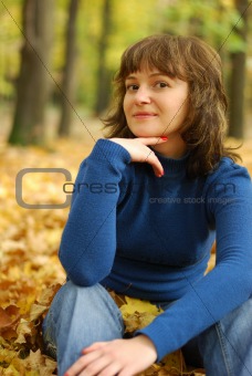 girl on a background autumn forest