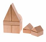 Toy houses. Wooden cubes combined in the form of constructions