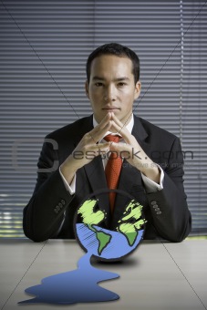 Business man concerned with earth