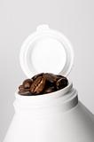 Medicine container with coffee beans