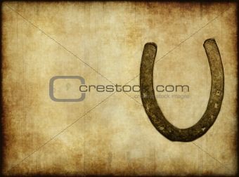 old horseshoe on paper or parchment